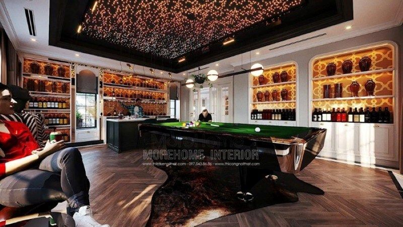 Bàn bi-a, quầy bar, hầm rượu, trần xuyên sáng đã tạo nên nét đẹp sang trọng, đẳng cấp trong sắp xếp nội thất phòng giải trí tại biệt thự.